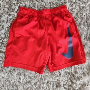 Red Nike shorts